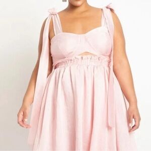 Eloquii Melissa Mercedes fit and flare dramatic bow dress.